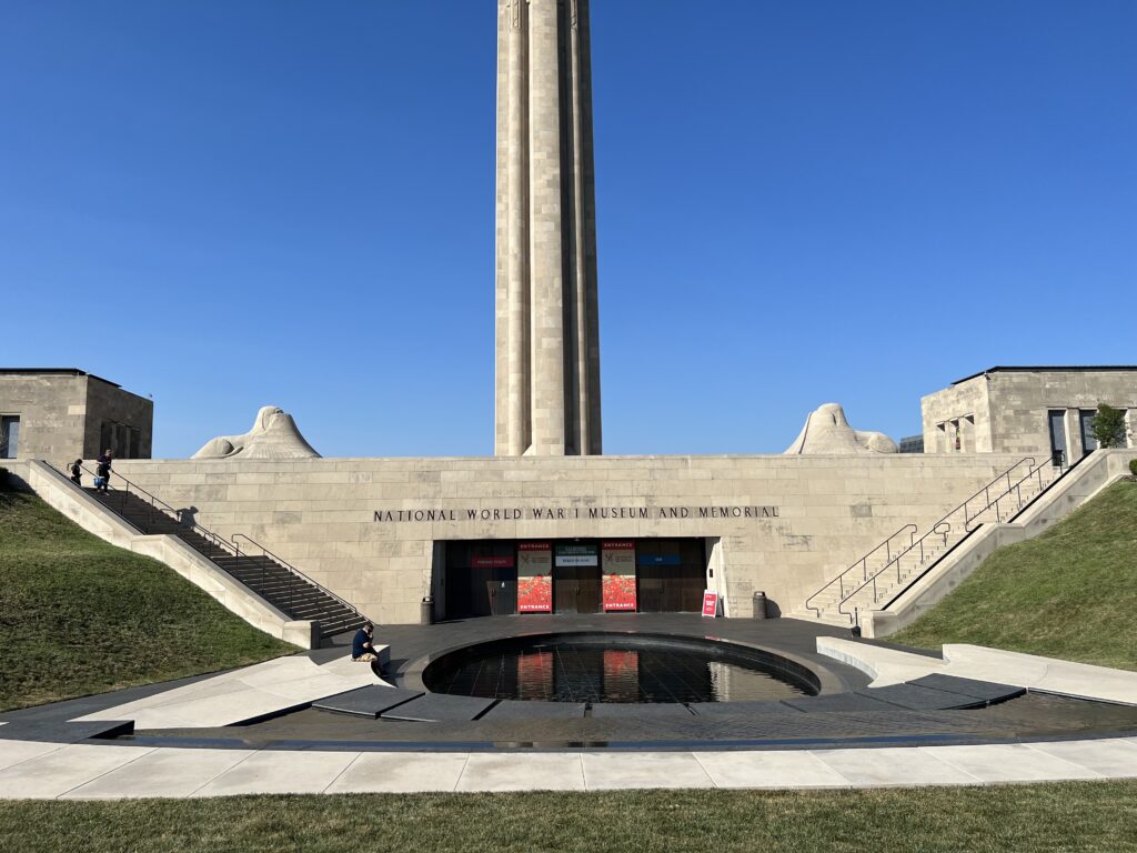 A picture of the National World War I Museum and Memorial seen from across the grassy mall in front of it.